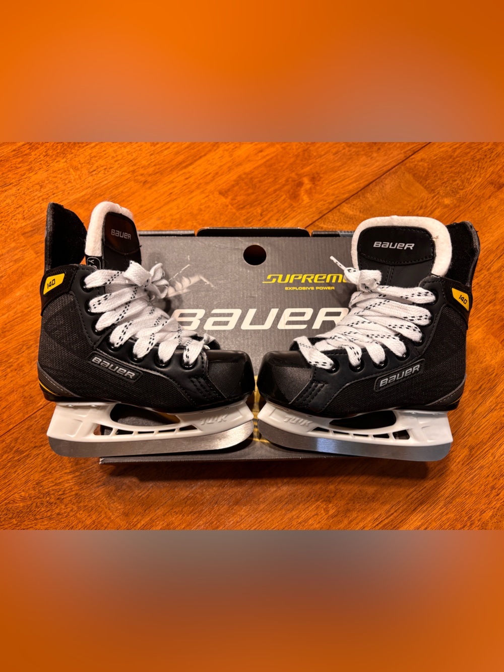 Bauer Kid’s Black and White Hockey Skates with Yellow Accent